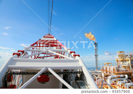 Offshore construction platform for production oil and gas. Oil and gas industry and hard work. Production platform and operation process by manual and auto function from control room. 93857908