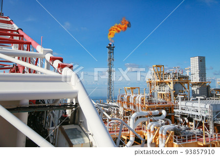 Offshore construction platform for production oil and gas. Oil and gas industry and hard work. Production platform and operation process by manual and auto function from control room. Offshore construction platform for production oil and gas. Oil and gas industry and hard work. Production platform and operation process by manual and auto function from control room. 93857910