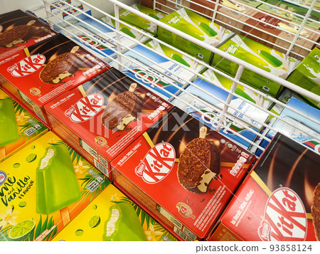 JOHOR, MALAYSIA - MARCH 5, 2022: Ice cream sticks packed in bulk in boxes and stored in the freezer. Displayed for sale in supermarkets. Has a price tag. 93858124