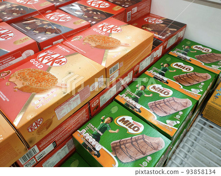 JOHOR, MALAYSIA - MARCH 5, 2022: Ice cream sticks packed in bulk in boxes and stored in the freezer. Displayed for sale in supermarkets. Has a price tag. JOHOR, MALAYSIA - MARCH 5, 2022: Ice cream sticks packed in bulk in boxes and stored in the freezer. Displayed for sale in supermarkets. Has a price tag. 93858134