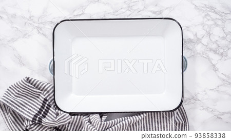 Flat lay. Step by step. Freshly baked brioche buns on a metal serving tray. Flat lay. Step by step. Freshly baked brioche buns on a metal serving tray. 93858338