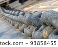 Anchor chain on ship deck. Close-up. Selective focus. 93858455
