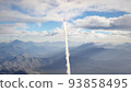 Rocket fly on mountains background 93858495