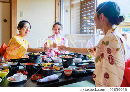 Women's trip A woman toasting at an inn 93859056
