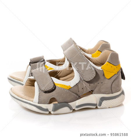 Children's orthopedic sports sandals on a white background. Children's orthopedic sports sandals on a white background. 93861588
