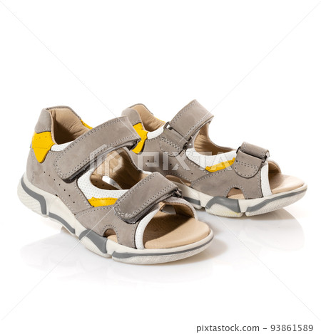 Pair of children's comfortable sports sandals isolated on white background. 93861589