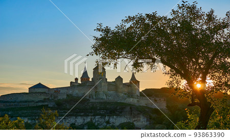 The old medieval fortress in all its glory in the rays of the warm setting sun 93863390