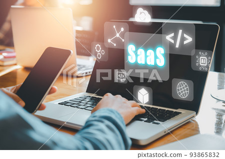 SaaS - software as a service, Businesswoman hand working on laptop to synchronize on SaaS host server to working on system for technology and business concept SaaS - software as a service, Businesswoman hand working on laptop to synchronize on SaaS host server to working on system for technology and business concept 93865832