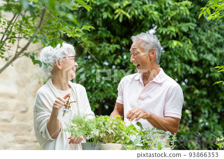 Senior couple gardening Senior couple gardening 93866353