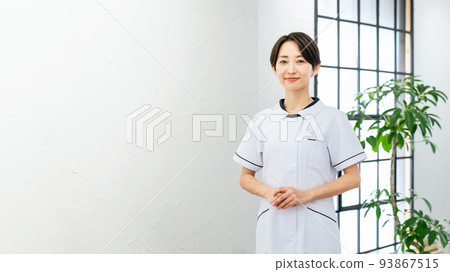 Female nurse in a white coat, beautician 93867515