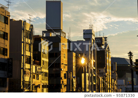 Osaka Minami, evening view from Dotonbori Bridge, building illuminated in golden color 93871330