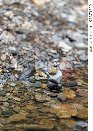 well-balanced stack of stones 93873760