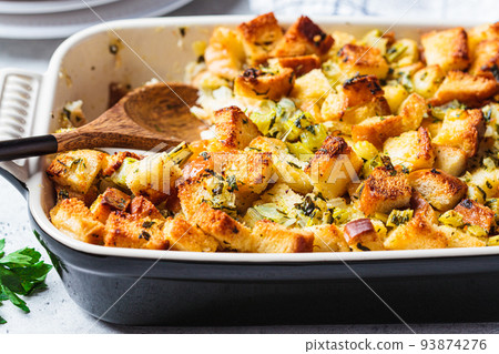 Traditional Thanksgiving stuffing. Bread casserole with celery. 93874276
