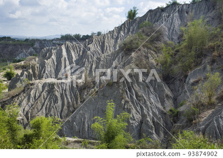 Badlands Geological landscape of Tianliao Moon World in Kaohsiung, Taiwan. it's famous for its similarity to the landscape of the Moon's surface. 93874902