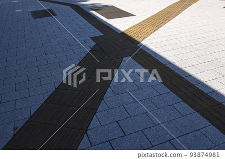 Summer, lingering summer heat, braille blocks and sidewalks Summer, lingering summer heat, braille blocks and sidewalks 93874981