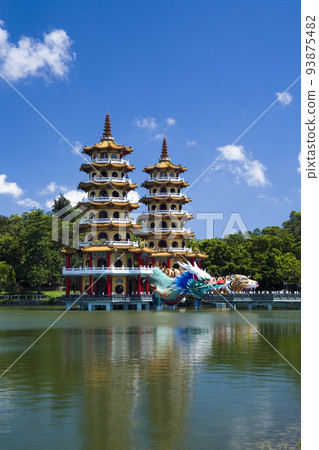 Architecture view of the Dragon and Tiger Pagodas in Lotus Pond of Kaohsiung, Taiwan. it is a temple located at Lotus Pond in Zuoying District, Kaohsiung, Taiwan. Architecture view of the Dragon and Tiger Pagodas in Lotus Pond of Kaohsiung, Taiwan. it is a temple located at Lotus Pond in Zuoying District, Kaohsiung, Taiwan. 93875482