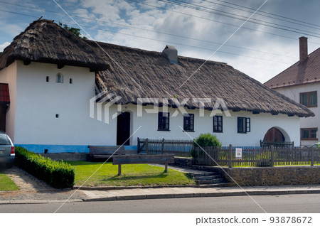 Old folk architecture. Museum of folk living and pearling. Senetarov village, South Moravia, Czech Republic. 93878672