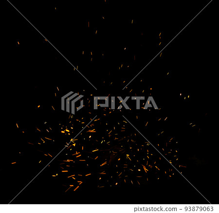 Campfire flame sparks isolated on black background. Fire flames heat energy heap in the night. Fire sparkles isolated on black Campfire flame sparks isolated on black background. Fire flames heat energy heap in the night. Fire sparkles isolated on black 93879063