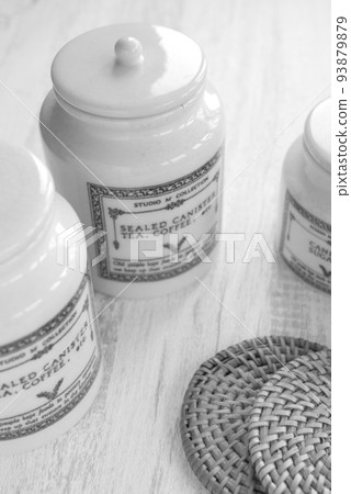 Antique canister and coaster [kitchen image] 93879879