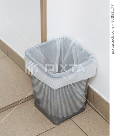 Close up of small trash can with recyclable garbage bag. Close up of small trash can with recyclable garbage bag. 93881177