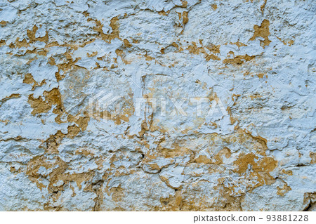 the surface of a vintage clay wall painted with white paint for a background or texture, an old house in the village the surface of a vintage clay wall painted with white paint for a background or texture, an old house in the village 93881228