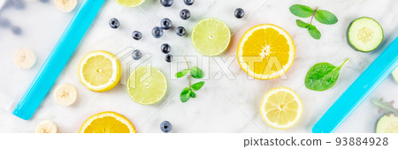 Food storage bags panorama with fresh fruit and vegetables, top shot 93884928