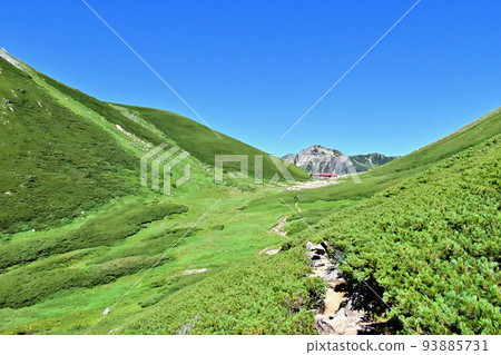 Sugoroku hut and Mt. Washiba in the Hida Mountains of the Northern Alps in August 93885731