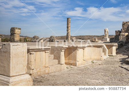 Roman ruins of Segobriga. Archaeological park. architectural facade of roman theatre. Spain 93887734