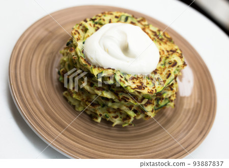 fried zucchini pancakes with greek yogurt fried zucchini pancakes with greek yogurt 93887837