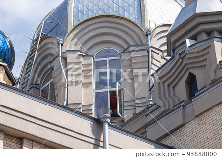 Golden domes of an Orthodox church with crosses Golden domes of an Orthodox church with crosses 93888000