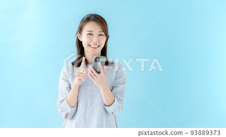 Woman smart phone blue back 93889373