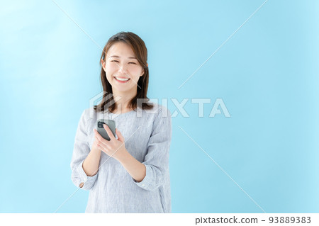 Woman smart phone blue back 93889383