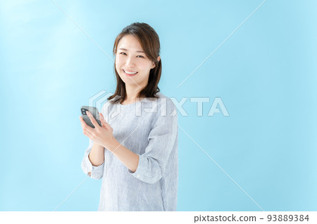 Woman smart phone blue back 93889384