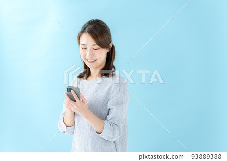 Woman smart phone blue back 93889388