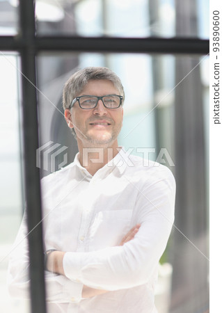 young successful businessman close-up in the office young successful businessman close-up in the office 93890600