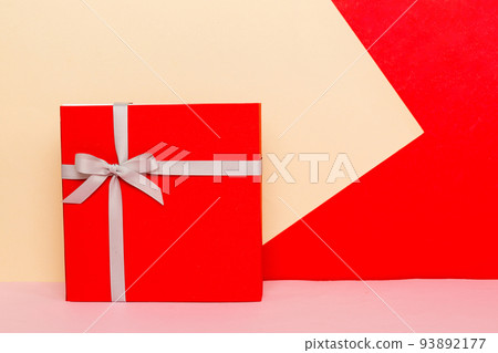 holiday handmade present tied gray ribbon bow top view with copy space. Flat lay holiday background. Birthday or christmas present. Christmas gift box concept with copy space holiday handmade present tied gray ribbon bow top view with copy space. Flat lay holiday background. Birthday or christmas present. Christmas gift box concept with copy space 93892177