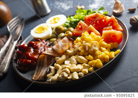 salad with vegetables boiled eggs and bacon salad with vegetables boiled eggs and bacon 93895825