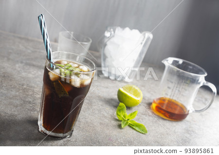Cuba Libre or long island iced tea cocktail with strong drinks 93895861