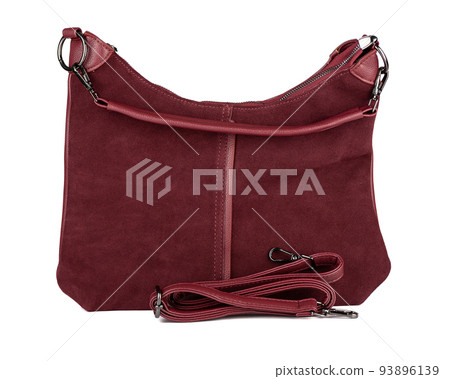 Fashionable suede women's handbag with a strap on a white background. 93896139