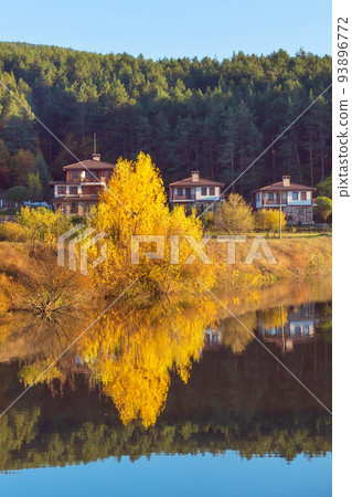 Autumn landscape with trees and houses, Bulgaria 93896772