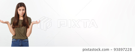 Girl with a suspicious look and hand on her side on a white isolated background. 93897228