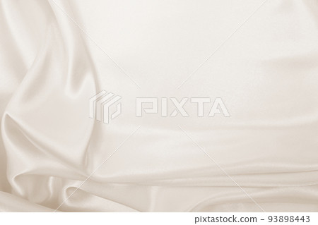 Smooth elegant golden silk or satin luxury cloth texture as wedding background. Luxurious background design. In Sepia toned. Retro style Smooth elegant golden silk or satin luxury cloth texture as wedding background. Luxurious background design. In Sepia toned. Retro style 93898443