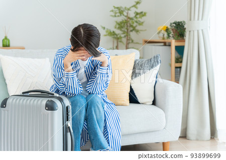 Middle woman preparing for a trip (depressed, shocked, canceled) Middle woman preparing for a trip (depressed, shocked, canceled) 93899699