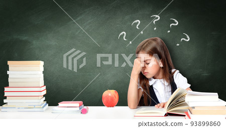 Frustrated and unhappy teen girl at school. Frustrated and unhappy teen girl at school. 93899860