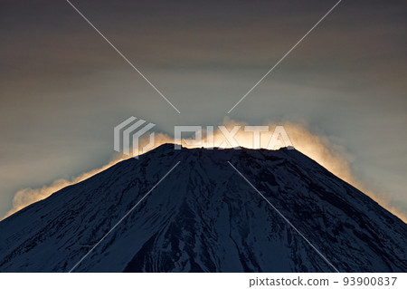 Mt. Fuji near dawn with snow smoke rising from Mt. Ryugatake Mt. Fuji near dawn with snow smoke rising from Mt. Ryugatake 93900837