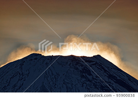 Mt. Fuji near dawn with snow smoke rising from Mt. Ryugatake Mt. Fuji near dawn with snow smoke rising from Mt. Ryugatake 93900838