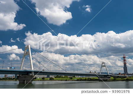 Cotton clouds floating above Toyosato Bridge and Yodo River 93901976