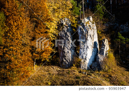 Rocky Formation - Father, mather and son in Moravian karst in the South Moravia, Czech republic. Autumn view. Rocky Formation - Father, mather and son in Moravian karst in the South Moravia, Czech republic. Autumn view. 93903947