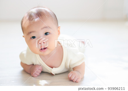 Lie down baby 3 months old copy space Lie down baby 3 months old copy space 93906211