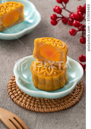Delicious Cantonese moon cake for Mid-Autumn Festival food mooncake on gray table background. 93909469